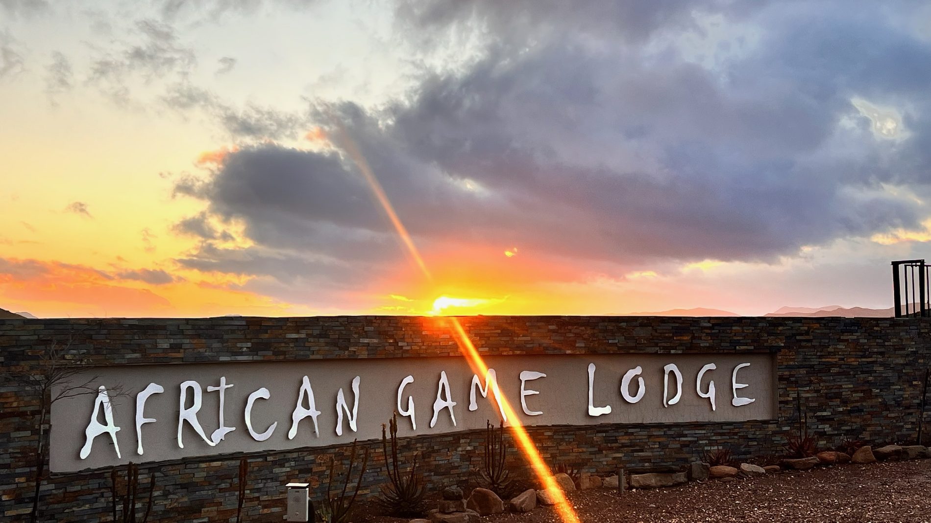 African Game Lodge entrance at sunset